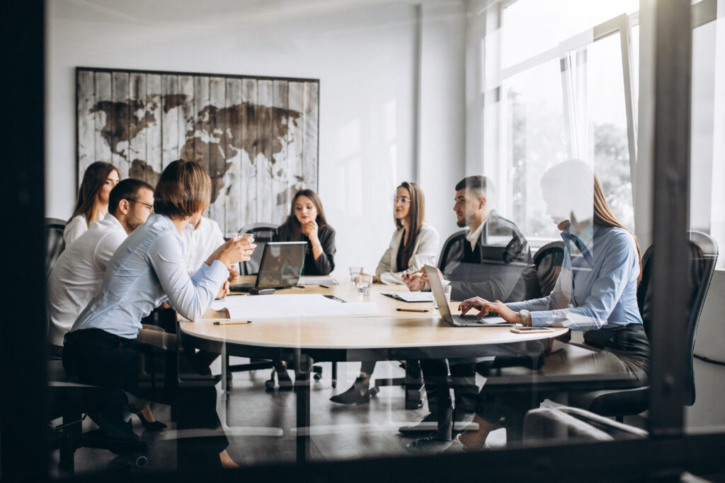 group of people working out business plan in an office